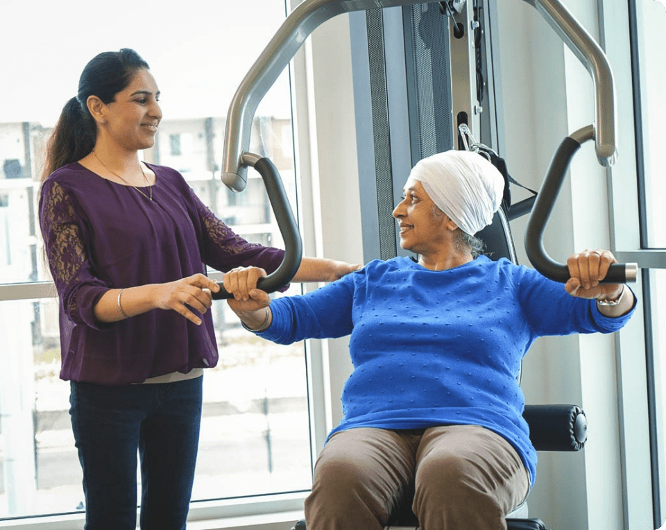 Amandeep Kaur with Patient | Max Physiotherapy | Physiotherapy, Chiropractic, Massage and Health & Wellness Clinic | NE Calgary