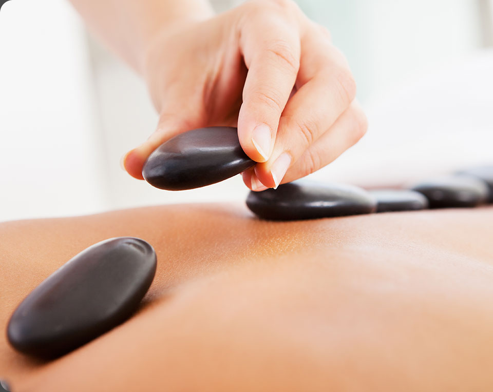 Hot Stone Massage | Max Physiotherapy | Physiotherapy, Chiropractic, Massage and Health & Wellness Clinic | NE Calgary